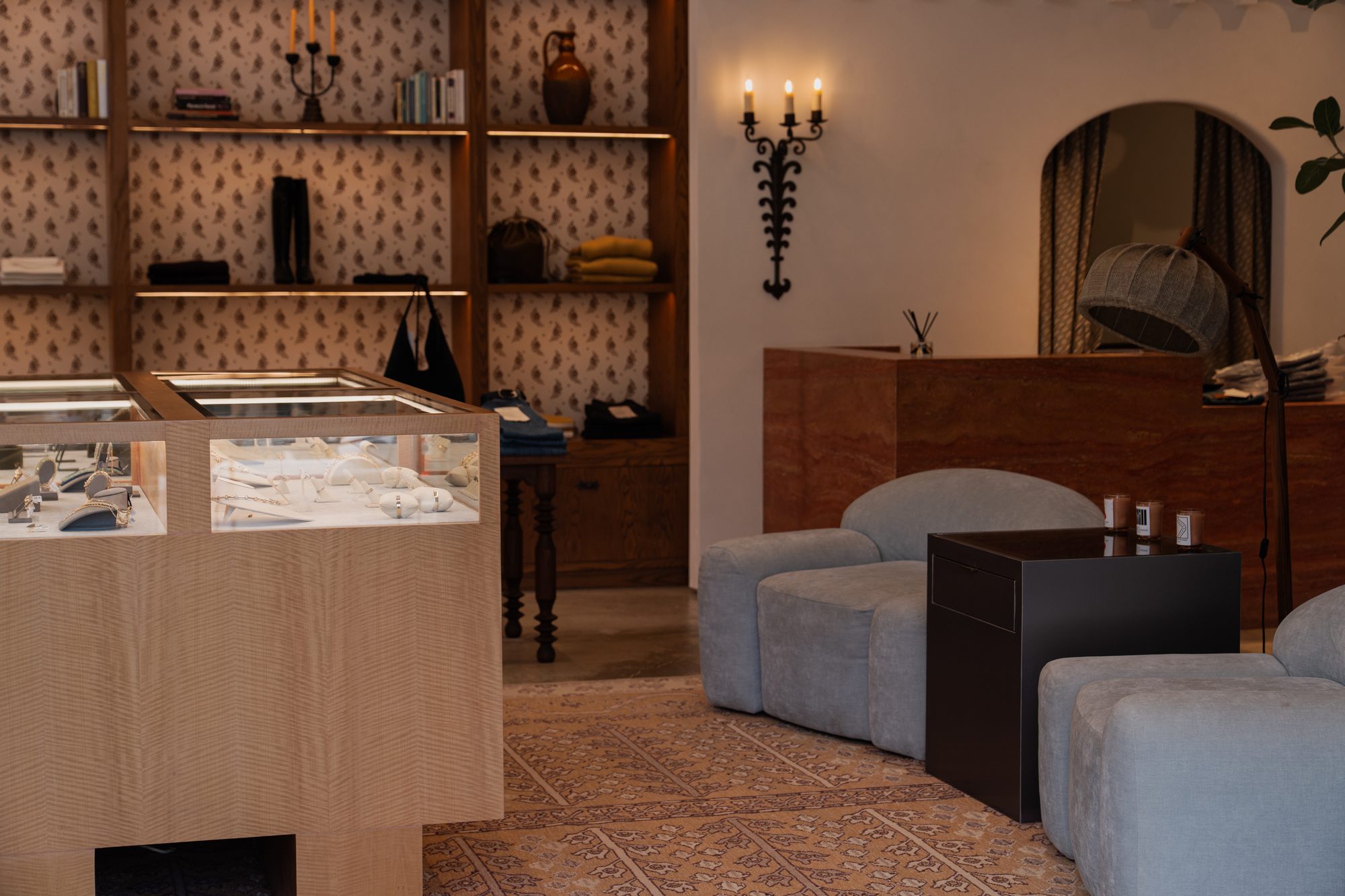 Boutique interior with lounge seating and display cases
